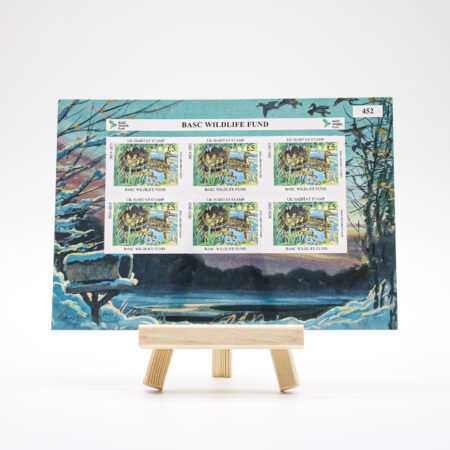BASC Wildlife Fund UK Habitat Stamp sheet displayed on a small wooden easel, featuring a mallard on water with ducklings in a nest and two taking flight.